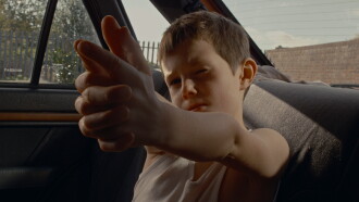Boy in the Back Seat Trailer