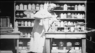 Mr. Edison at Work in His Chemical Laboratory Trailer