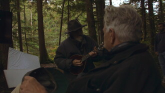 The Man with the Gray Elevated Hair Trailer
