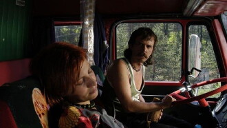 The Red Colored Grey Truck Trailer