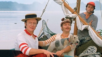 Three Men in a Boat Trailer
