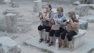 Women Visiting a City Trailer