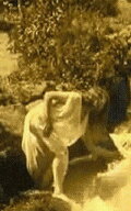 Nude Woman by Waterfall
