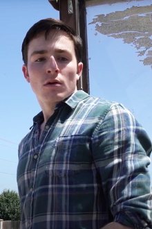 Before He Boards the Bus Trailer