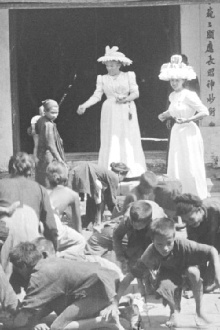 Indochina: Children Gathering Coins Scattered by Western Women Trailer