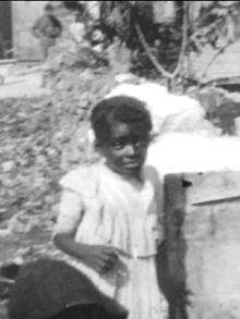 Native Woman Washing a Negro Baby in Nassau, B.I. Trailer
