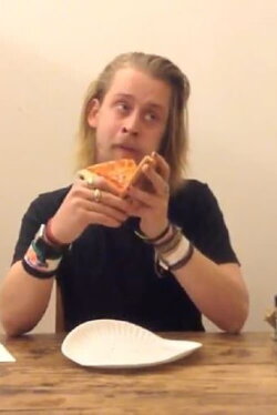 Macaulay Culkin Eating a Slice of Pizza (2013) Macaulay Culkin Eating a Slice of Pizza (2013)